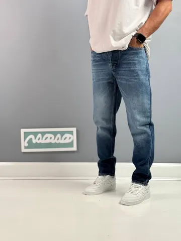 شلوار جین مردانه مام فیت آبی تیره ساده هاشور پرفروش کد 2049231